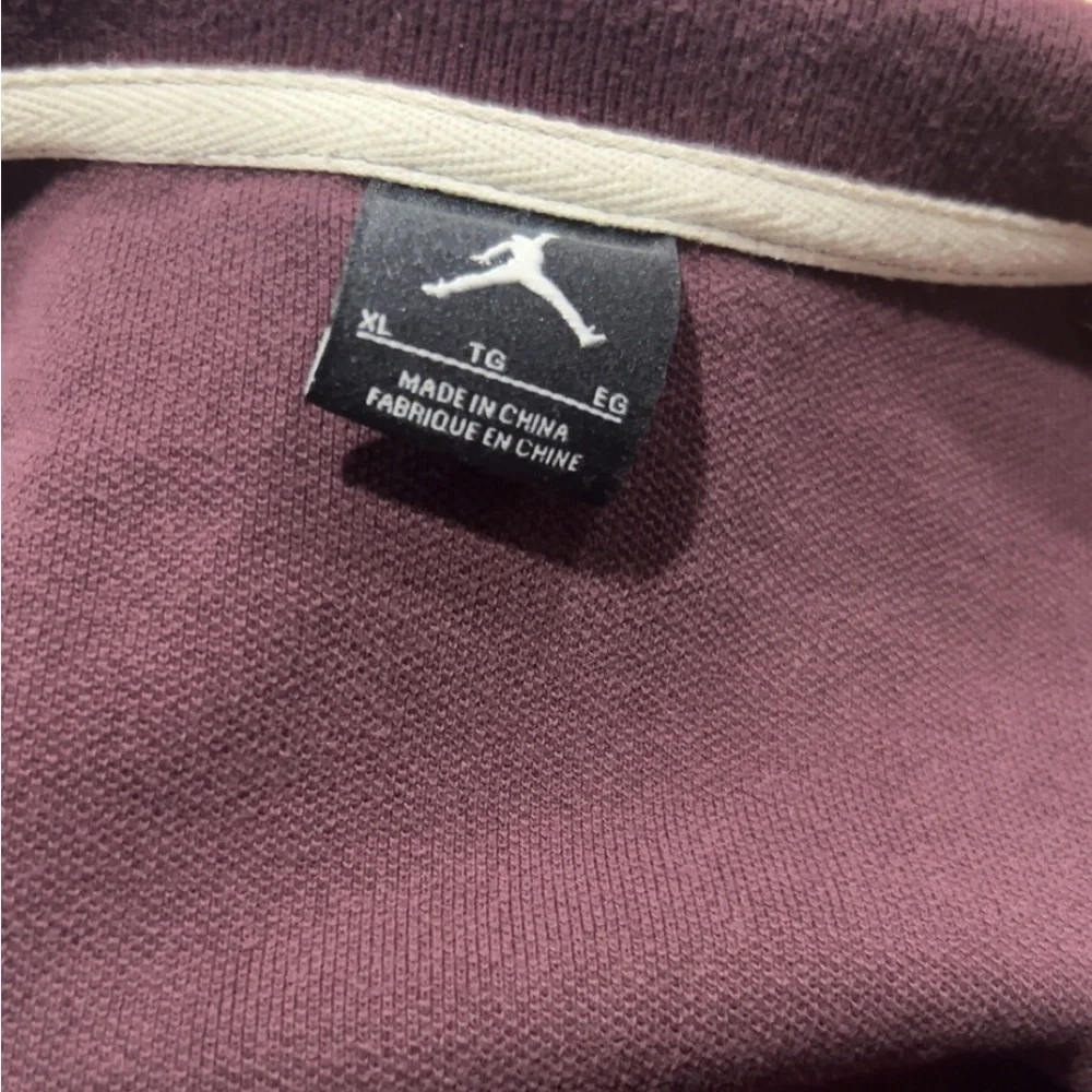Nike Jordan Team men's golf polo shirt in a burgundy color